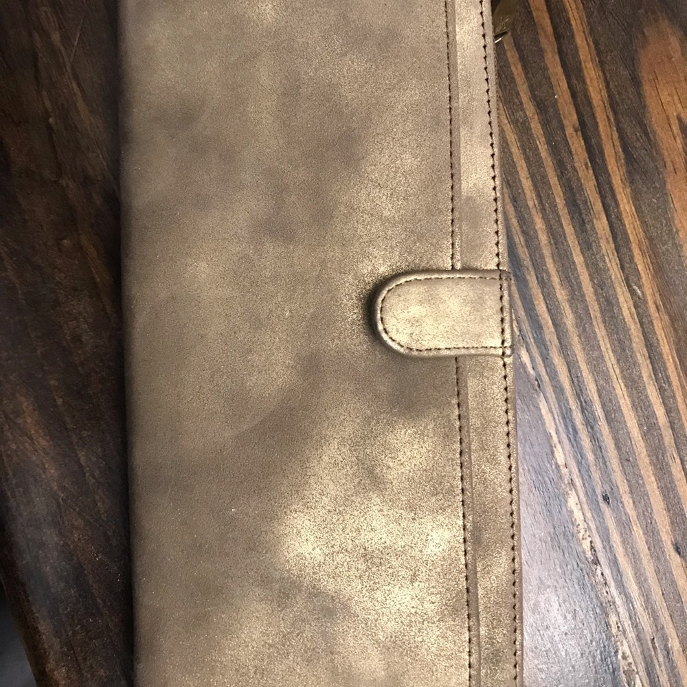 Hobo brand wallet. Gold tan color.